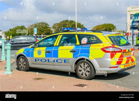 Sussex Police car parked by the roadside in Brighton, East Sussex ...