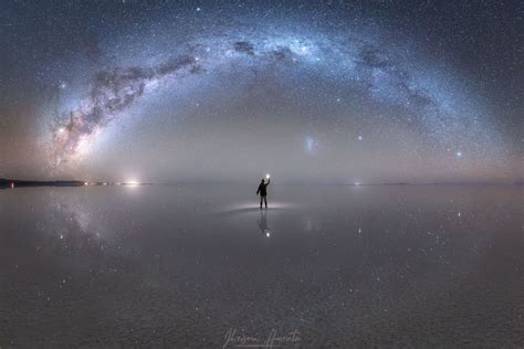 The Milky Way above the Salar de Uyuni salt flat in Bolivia. After it rains the thin layer of ...