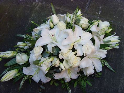 White spray | Funeral flowers, White lilies, Flowers