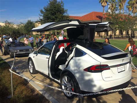 Model X vs. DeLorean "The Doors that Go Like This" | Flickr