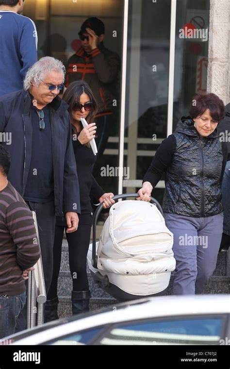 Flavio Briatore and his wife Elisabetta Briatore leaving the hospital ...