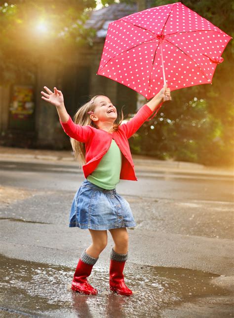 The little girl with an umbrella on rainy day Stock Photo 06 free download