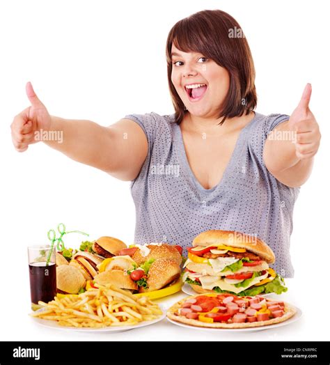 Overweight woman eating fast food Stock Photo - Alamy