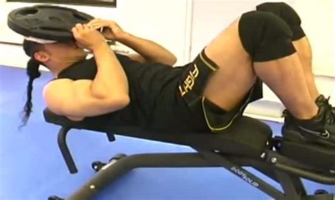 Weighted Lying Neck Flexion Exercise Form Guide with Video & Pictures