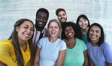 Group multiracial friends having fun outdoor - Happy mixed race people ...