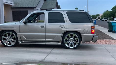 2003 Yukon/Tahoe Denali lowered on 24s 4/6 drop - YouTube