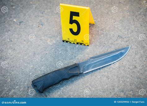 Crime Scene Investigation. the Weapon, a Knife. Stock Photo - Image of ...