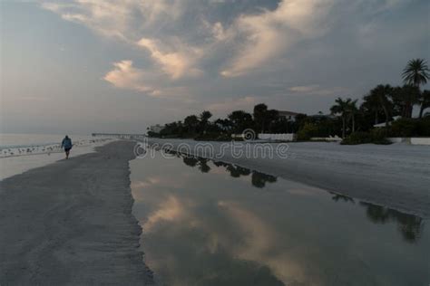 Beach Walk at Low Tide during Sunset at Madeira Beach Stock Image - Image of rocks, pond: 264855613