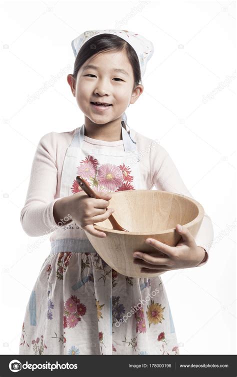 Cute Asian Girl Cooking — Stock Photo © earlyspring #178000196