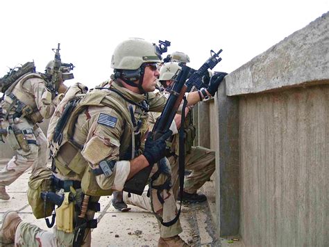 SEAL Team 3, Delta platoon on rooftop during a firefight in eastern ...