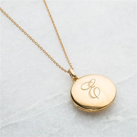 engraved initial locket necklace by carrie elizabeth jewellery | notonthehighstreet.com