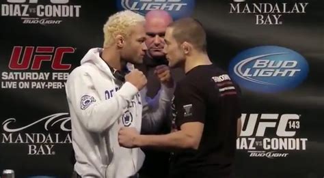 Nick Diaz vs Carlos Condit staredown pic from UFC 143 press conference ...