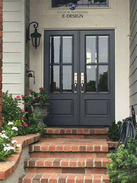 Front door Benjamin Moore Charcoal Slate, red brick stairs on exterior. Kylie M INteriors ...