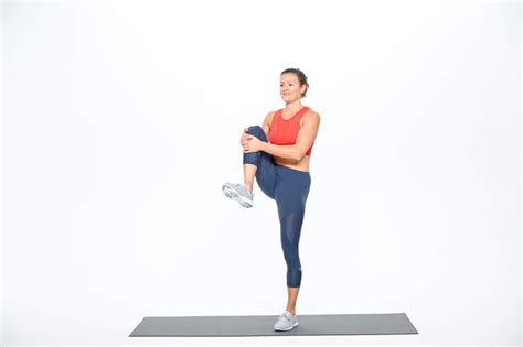 How to Do Standing Knee Hugs | POPSUGAR Fitness