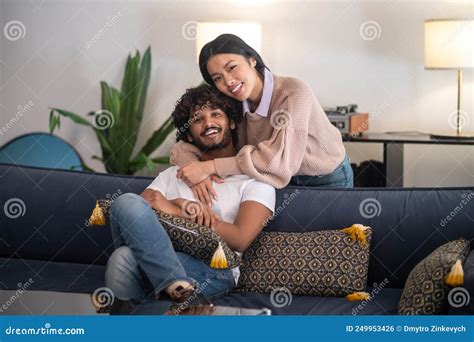 Two Young People Hugging and Looking Happy and Cheerful Stock Photo ...