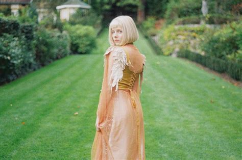 AURORA announces third album with new single "Giving In To The Love ...