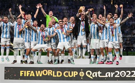 Messi holding the World Cup trophy: Best images of Argentina becoming ...