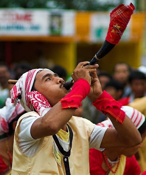 Bihu dancer, playing a 'pepa' (horn), Bihu of Assam, Festival of New Year mid April Bihu Dance ...