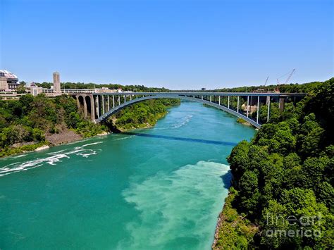 Rainbow Bridge - Niagara Falls Photograph by Eve Spring