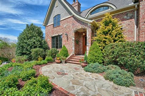 Pin by Jennie N on Landscaping--Design Ideas | Red brick exteriors, Exterior brick, Tudor house