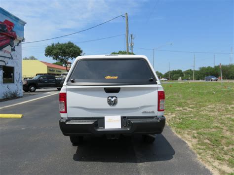 Dodge RAM LEER 100R with Blacked Out Nerf Bars - TopperKING : TopperKING | Providing all of ...