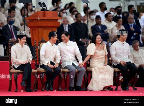 President-elect Ferdinand "Bongbong" Marcos Jr. and his family attend the inauguration ceremony ...