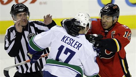 Flames catch Canucks scoreboard watching - The Globe and Mail