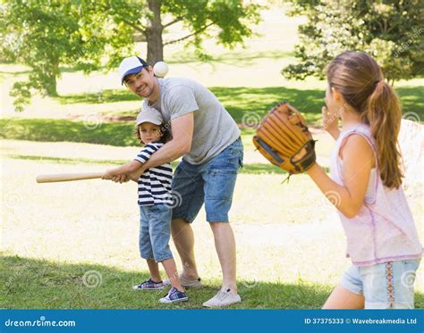 Family Playing Baseball in the Park Stock Image - Image of cheerful, male: 37375333