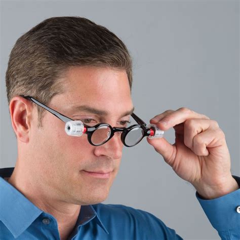 The Only Adjustable Focus Reading Glasses - Hammacher Schlemmer ...