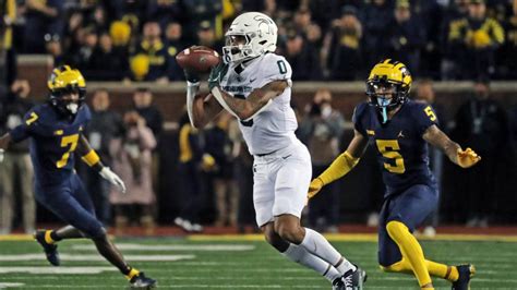 Best photos from Michigan State, Michigan rivalry match-up