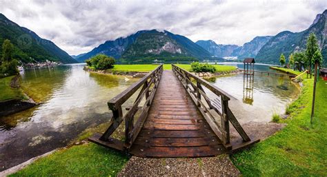 wooden bridge over the river 6946350 Stock Photo at Vecteezy