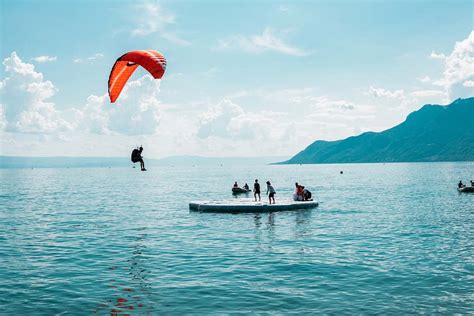 Adventure Person Doing Paragliding During Daytime Gliding Image Free Photo