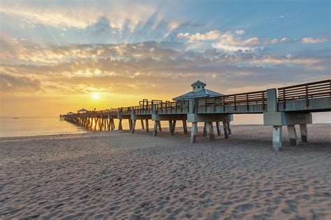 Juno Beach Pier Sunrise from Beach Photograph by Kim Seng | Fine Art ...