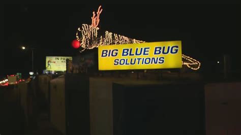 Lighting of Big Blue Bug sign of holiday season