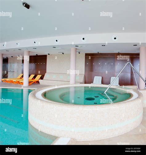 Exclusive indoor swimming pool with clear water Stock Photo - Alamy