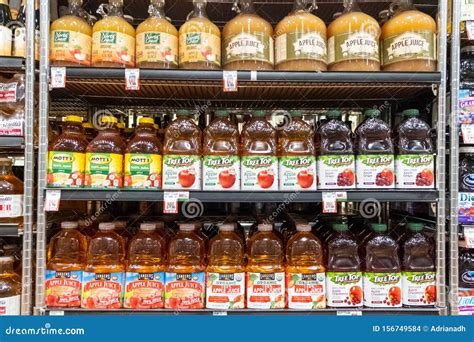 Assorted Brands of Apple Juice Editorial Stock Image - Image of groceries, display: 156749584