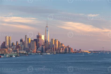 Downtown Manhattan skyline at sunset 11103302 Stock Photo at Vecteezy