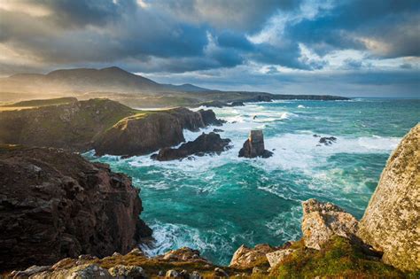 First light on the rugged coastline of the Isle of Lewis, the Outer ...