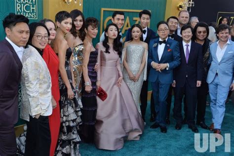 Photo: Henry Golding and Liv Lo attend the "Crazy Rich Asians" premiere in Los Angeles ...