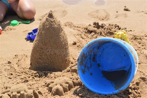 Building a sand castle stock image. Image of leisure - 113400201