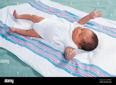 Moro baby reflex hi-res stock photography and images - Alamy