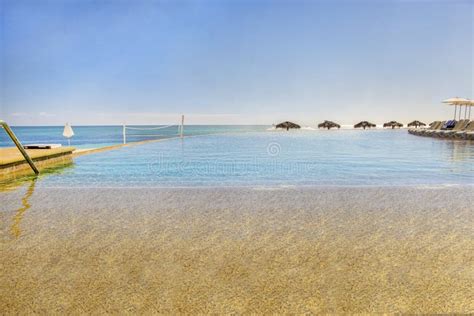 Infinity Pool on the Beach stock image. Image of vacation - 275484333