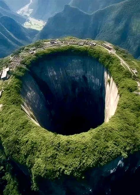 The deepest and largest natural well on the WHOLE planet in Xiaozhai Tiankeng, China!! So big ...