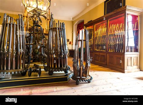 Museum with old weapons, ancient armory storage Stock Photo - Alamy