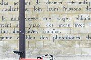 Le Bateau Ivre poem on Paris wall | Holiday Stock Photos ~ Creative Market