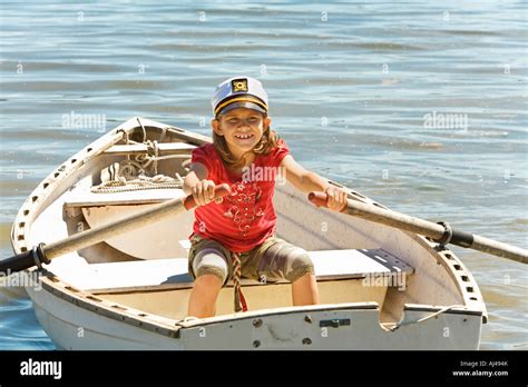 Young girl in row boat Stock Photo - Alamy