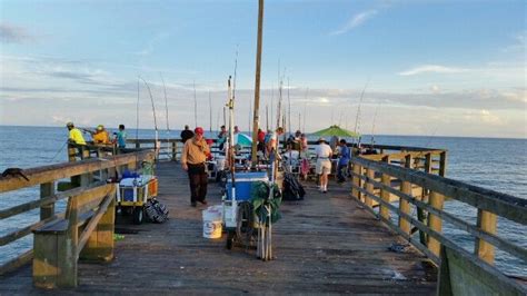 Surf City NC fishing pier 13 October 2014. Very serious fishermen ...