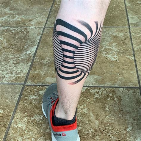 25 Optical Illusion Tattoos That Will Melt Your Brain