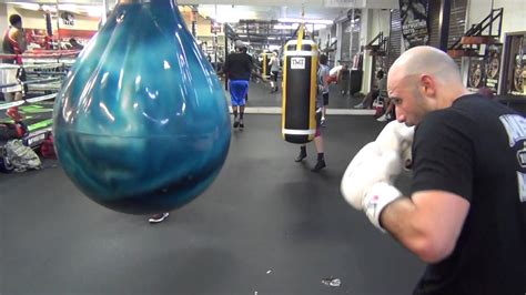 Amer Abdallah on the uppercut bag at the Mayweather Boxing Club - YouTube