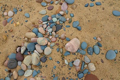 Rocks and Sand Photograph by Roxanne Distad - Pixels